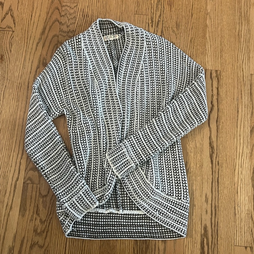 White and olive green cardigan